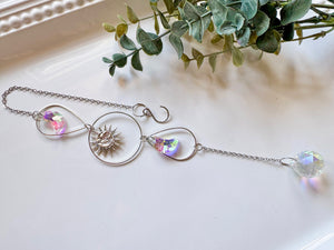 Sun & Moon Face with Iridescent Moons