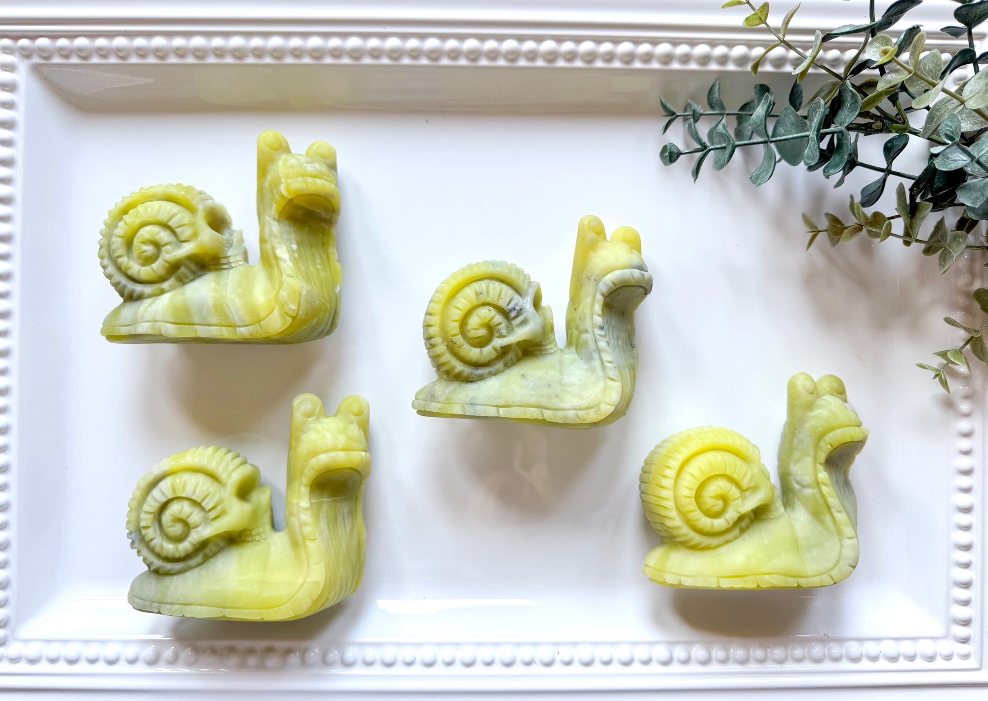 Xiuyan Jade Snail with Skull Shell Carving