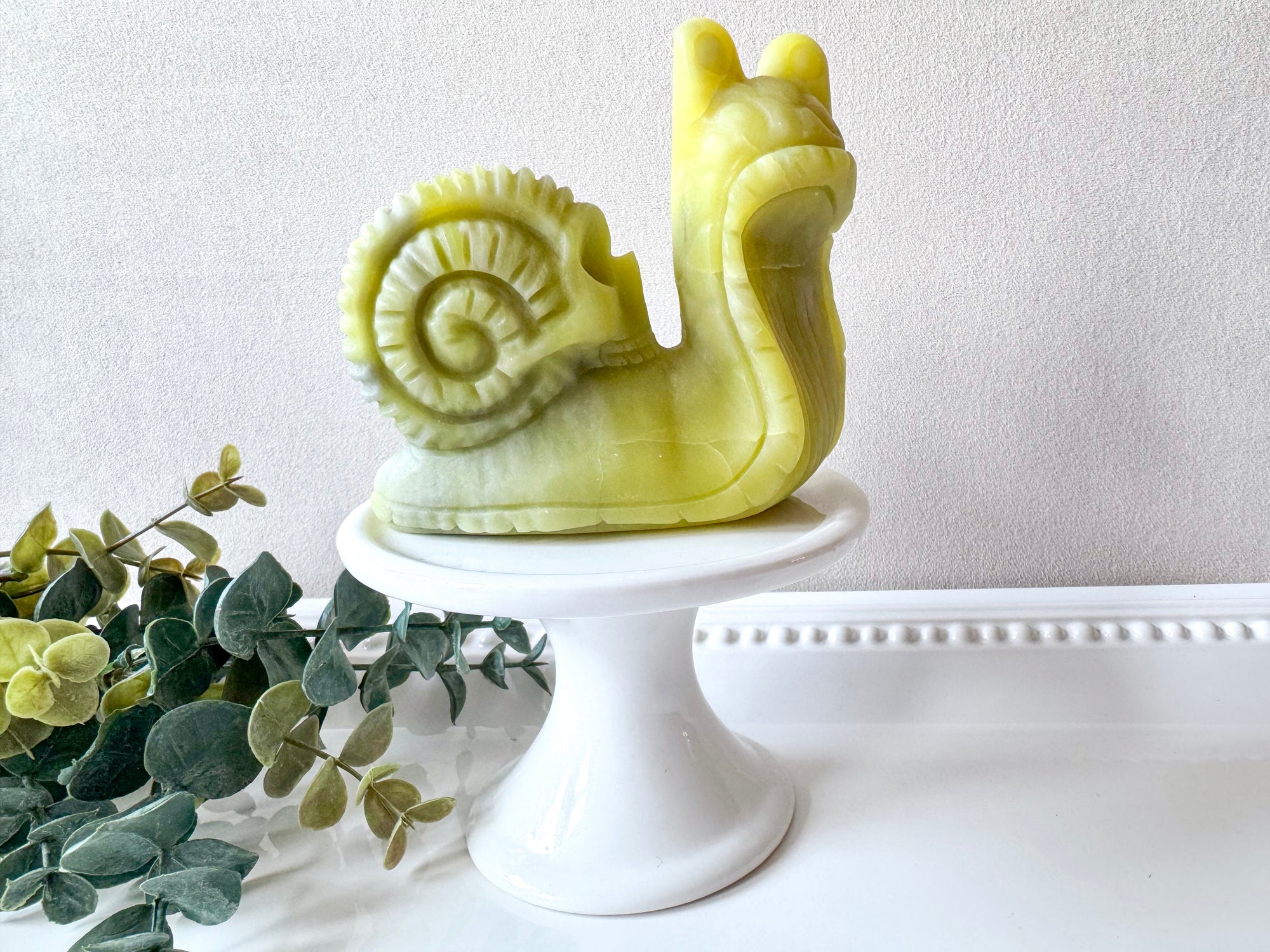 Xiuyan Jade Snail with Skull Shell Carving