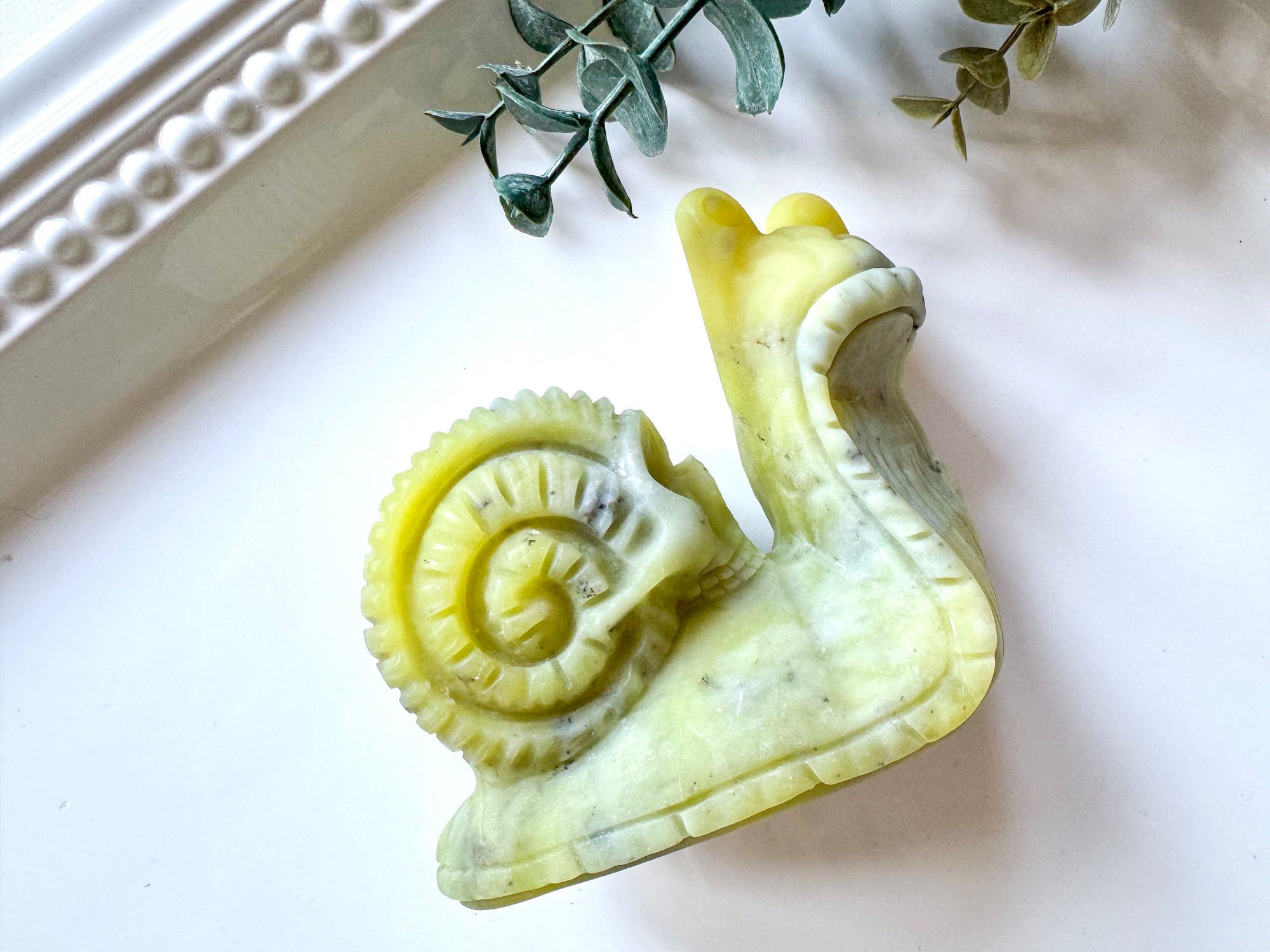 Xiuyan Jade Snail with Skull Shell Carving