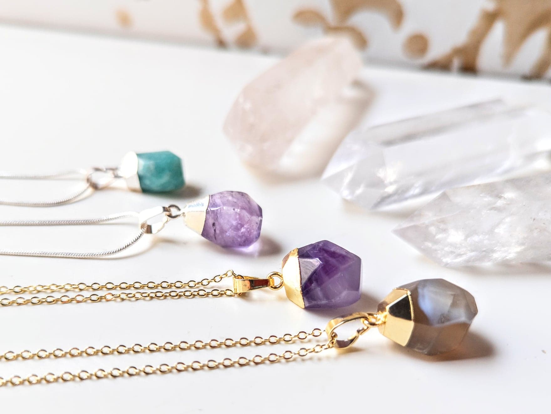 Faceted Crystal Drop Necklaces in Gold and Silver