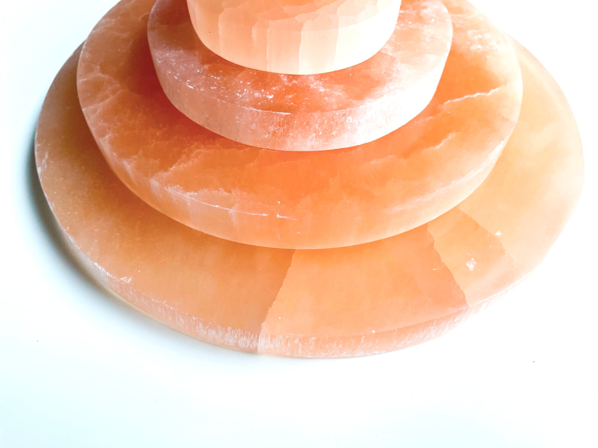 Peach Selenite Round Charging Plate